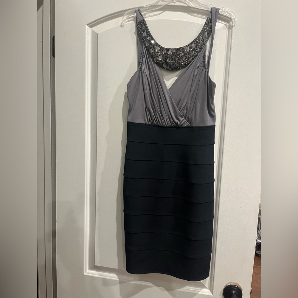 Elegant Maria Bianca Nero brand cocktail dress with embellished neck.